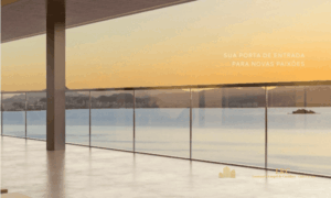 Lounge externo do condomínio Meraki Sunset com lareira ecológica e vista panorâmica para o mar no bairro João Paulo.