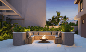 Espaço fogo (fire pit) externo com estofados circulares e iluminação cênica para noites frias.